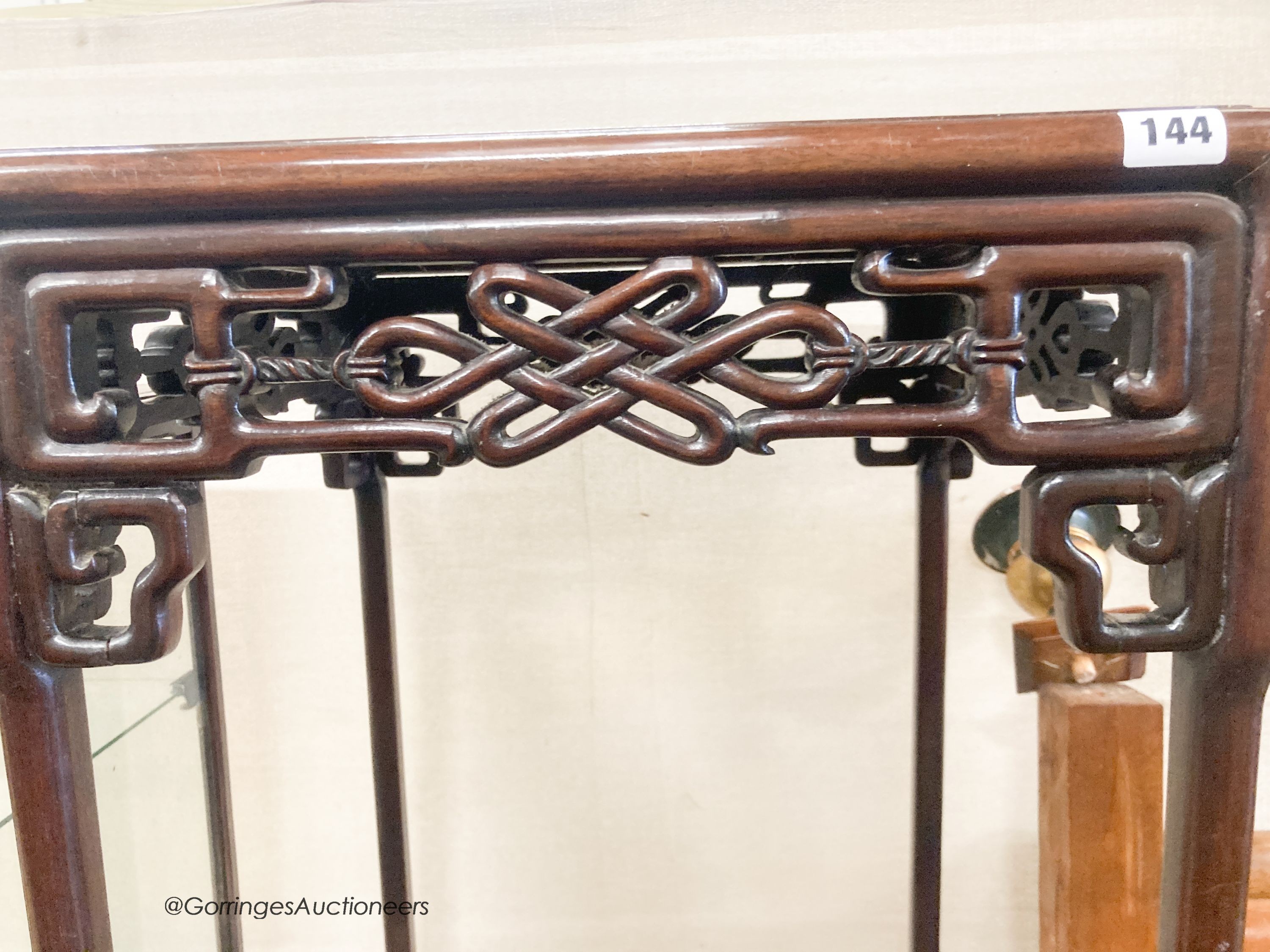 A Chinese hardwood square topped table, width 47cm, height 83cm